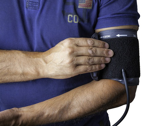 man monitoring his blood pressure